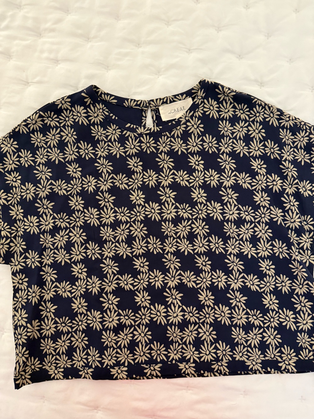 THE GREAT. Navy Crop Top with Cream Daisy Print